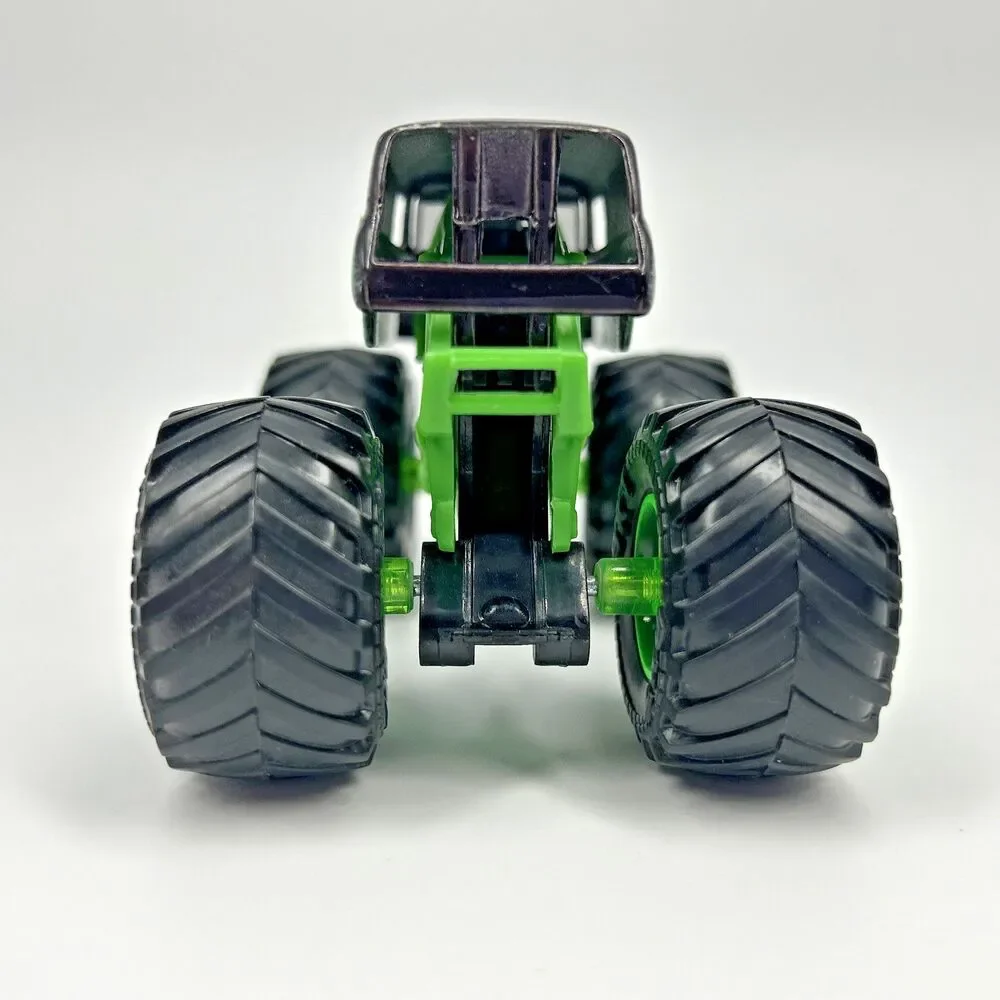 Monster Jam Grave Digger 1:64 Monster Truck Green Rims BKT Tires Bad to the bone